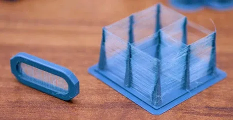 Нити на модели из PETG после печати